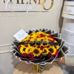 Bouquet de rosas y girasoles