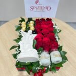 Caja con rosas, velas, arcangel y Ferrero Rocher
