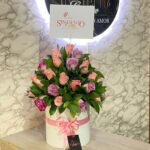 Cilindro de rosas surtidas