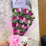 Ramillete de rosas con peluche