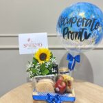 Ancheta saludable con girasol y globo