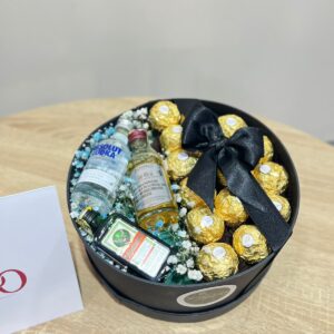Caja con licor y Ferrero Rocher