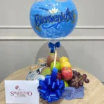 Ancheta de frutas con globo