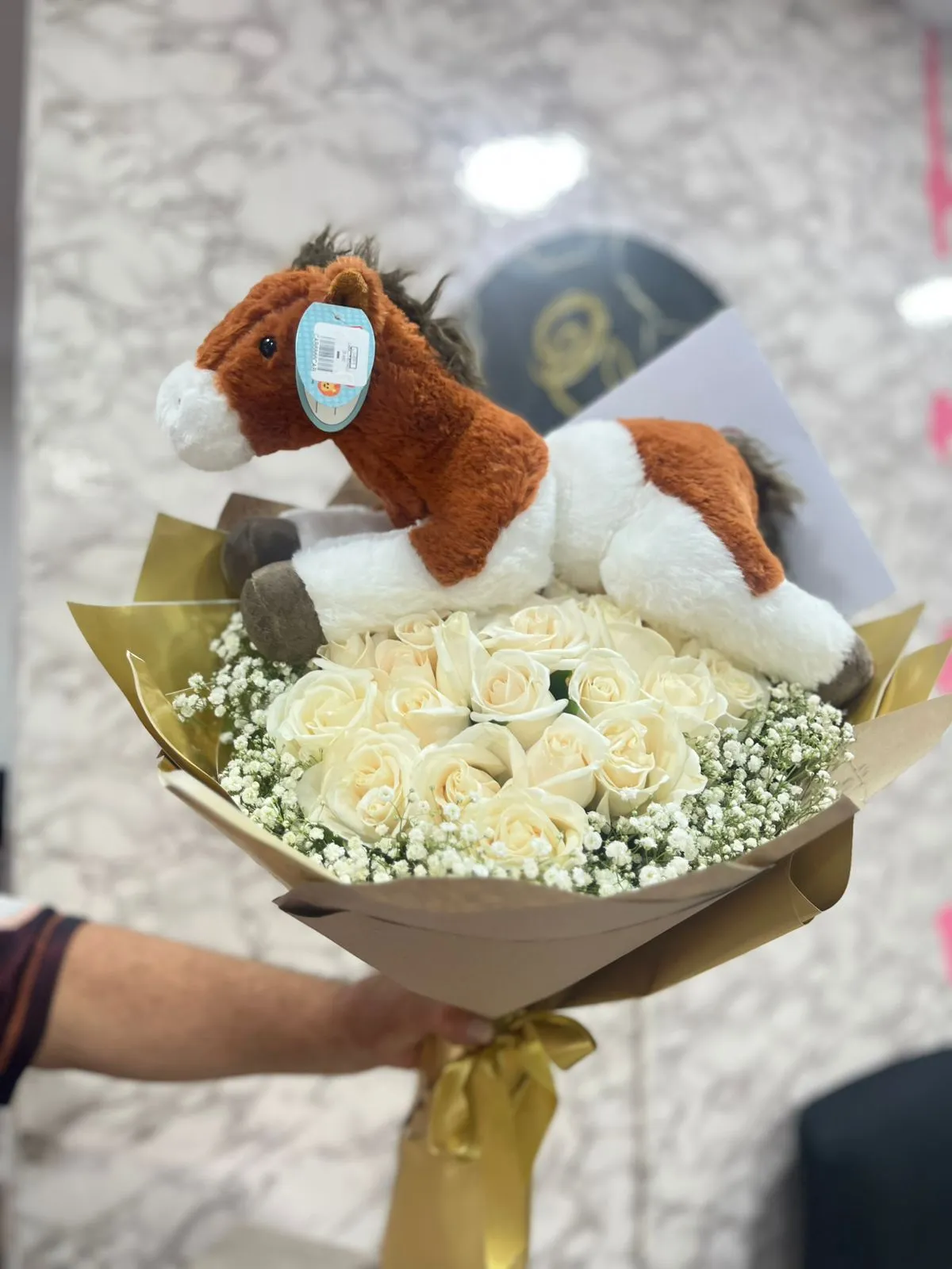 Bouquet de rosas con peluche