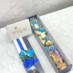 Caja con arcangel, chocolatina y fresas con chocolates